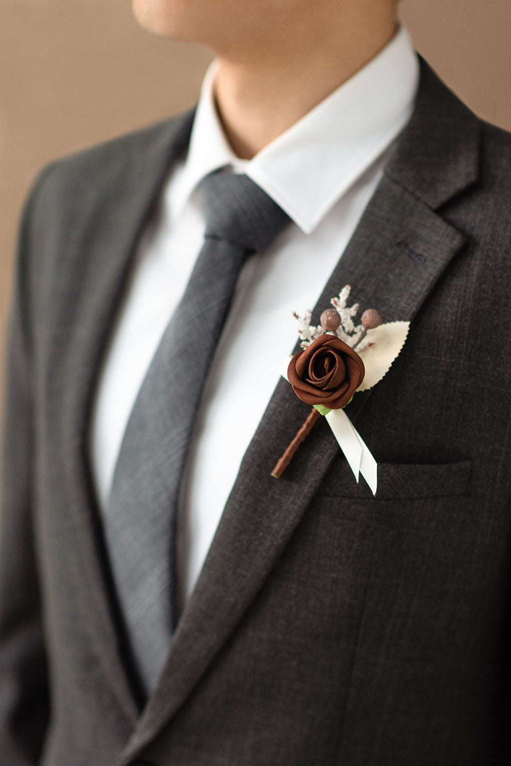 Boutonnieres for Guests in White & Beige