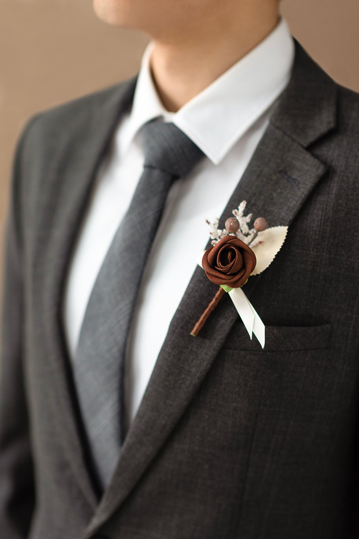 Boutonnieres for Guests in White & Beige