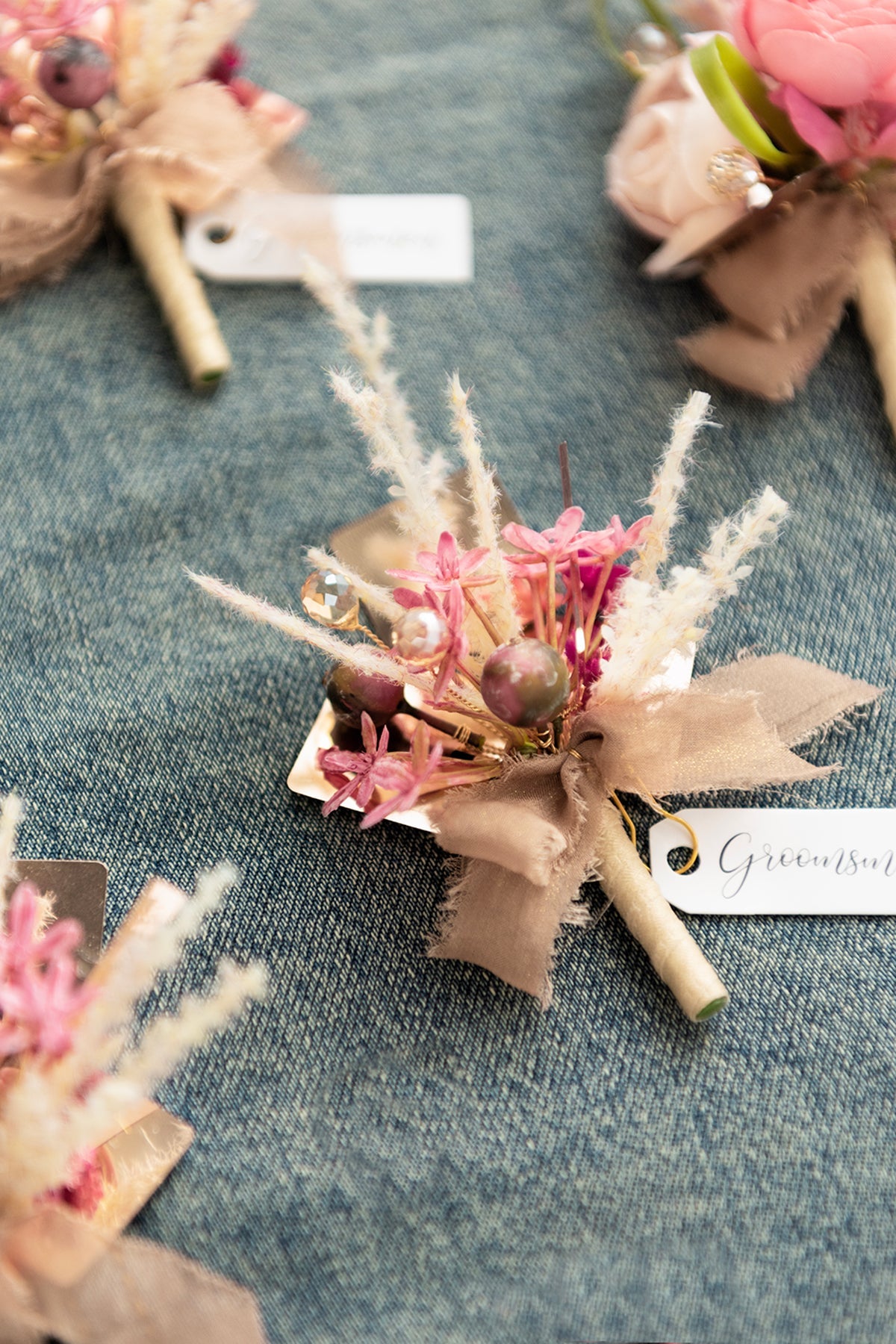 Boutonnieres in Valentine Magenta