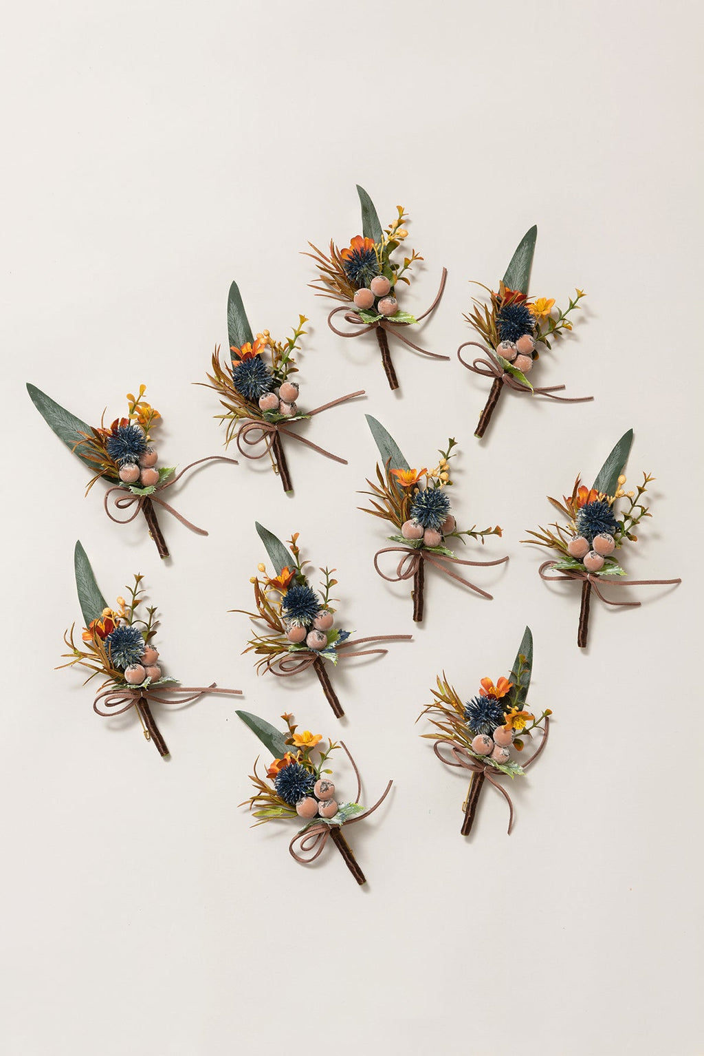 Boutonnieres for Guests in Dark Teal & Burnt Orange