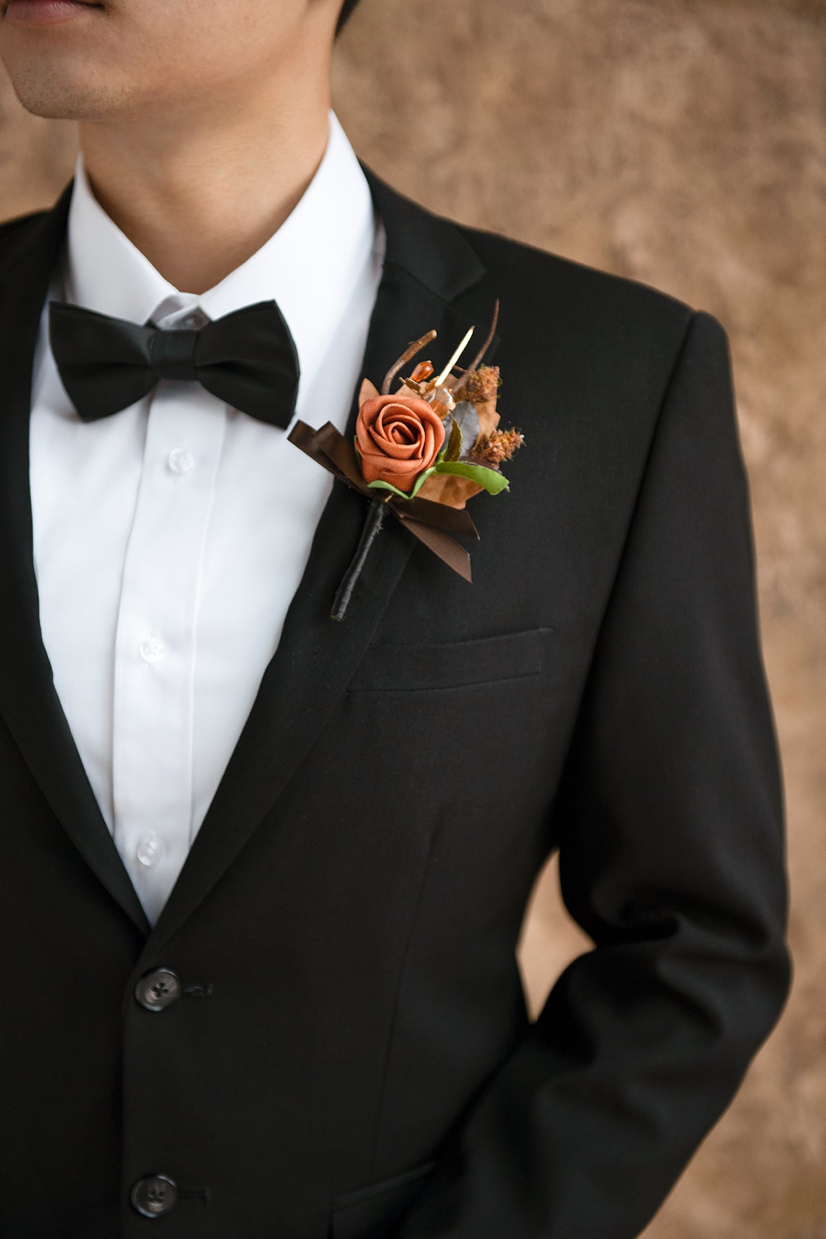 Boutonnieres in Black & Pumpkin Orange
