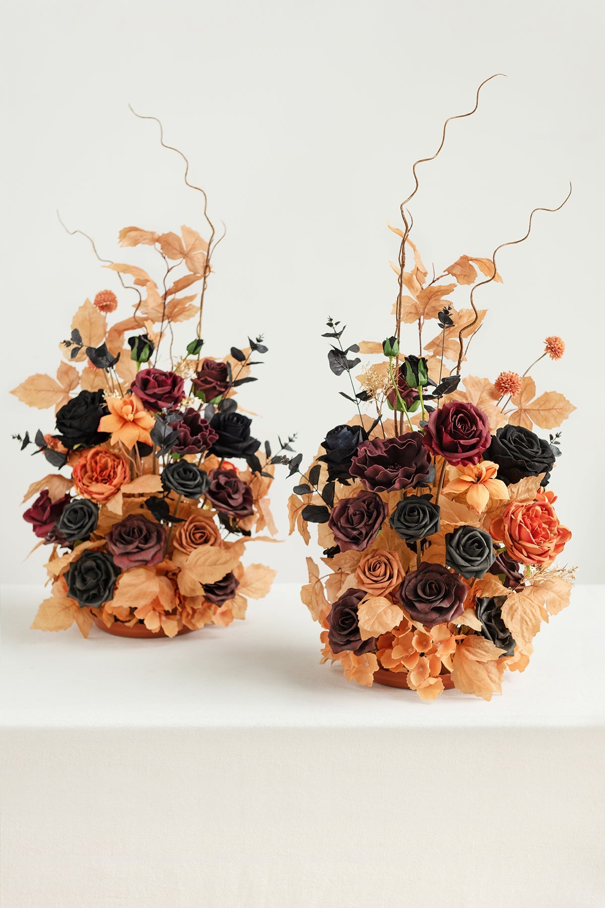 Oversized Free-Standing Ground Flower Arrangements in Black & Pumpkin Orange
