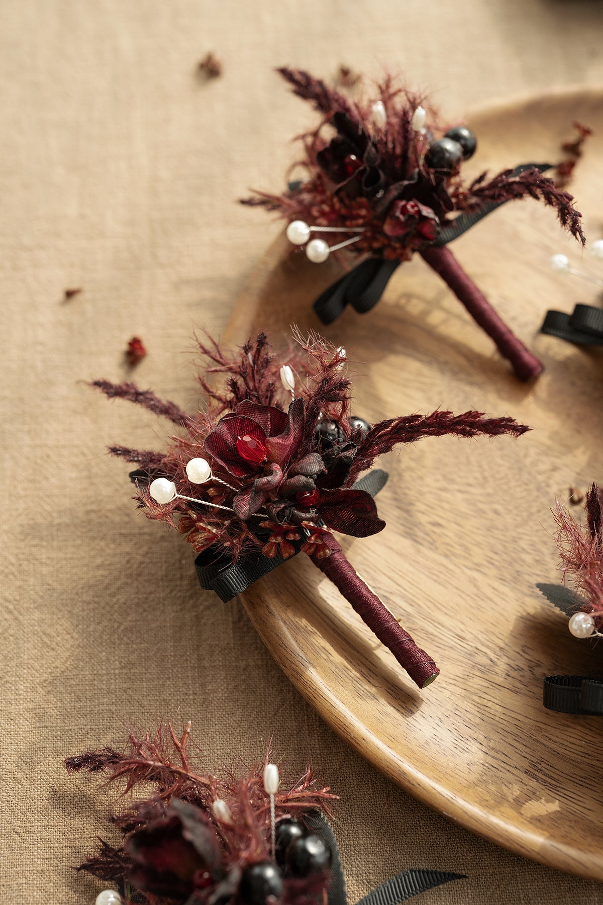 Boutonnieres for Guests in Moody Burgundy & Black
