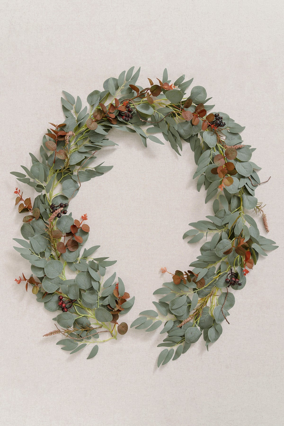 6ft Eucalyptus and Willow Leaf Garland with Filler Flowers in Sunset Terracotta