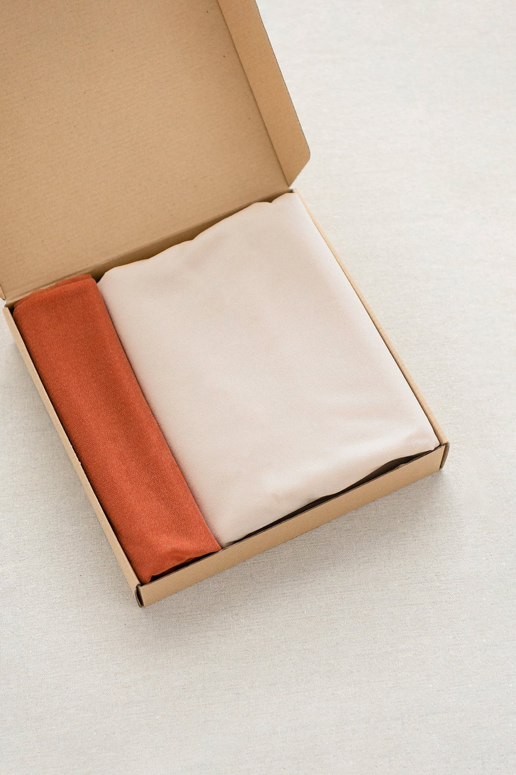 Table linens in Sunset Terracotta